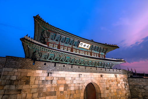 Hwaseong Fortress's Janganmun Gate at dusk. This famous historical site is a UNESCO World Heritage Site, It was almost the former capital of Korea.