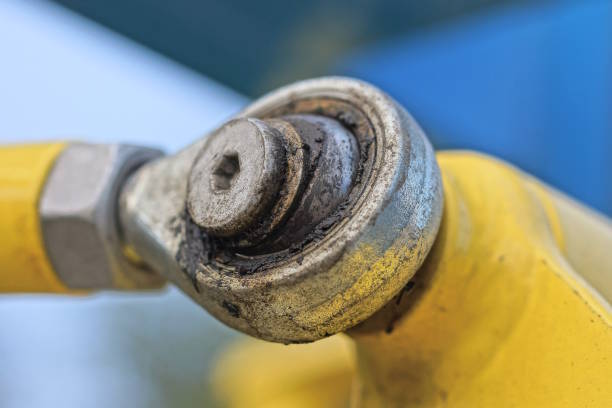 istock part of a gray yellow iron structure with a hinge in a metal pipe 1722354817