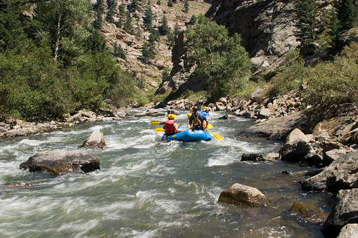 Rafting into a beautiful Colorado canyon in the summertime.http://www.istockphoto.com/file_thumbview_approve.php?size=1&id=4057444