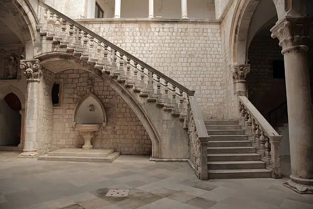 Photo of Stone staircase and courtyard.