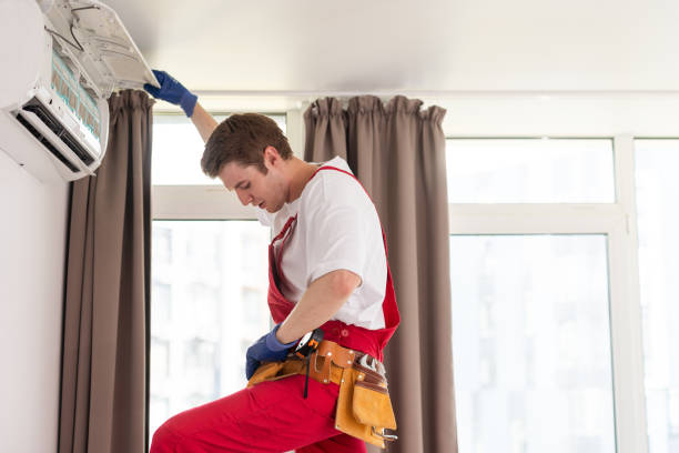 istock technician service checking and repairing air conditioner indoors 1722365141