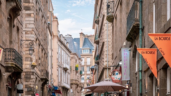 Saint Malo, France – June 08, 2023: A historic alley with old buildings in Saint Malo, France