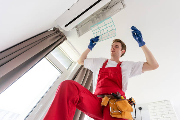 istock technician service checking and repairing air conditioner indoors 1722368966