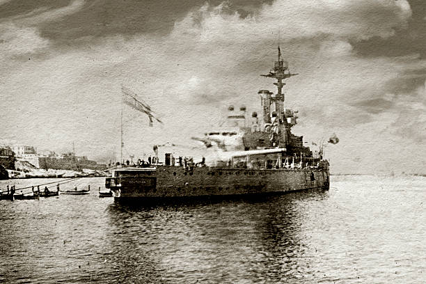 HMS Centurion "Vintage photograph of HMS Centurion taken in 1923, in Malta harbour. She took part in the Battle of Jutland in the first world war, and she also took part in world war two. NOTE: Real historic photo so the quality is not great." hms dreadnought stock pictures, royalty-free photos & images