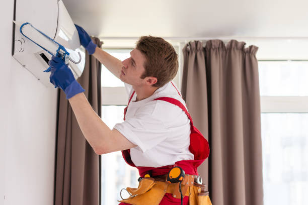 istock technician service checking and repairing air conditioner indoors 1722369710