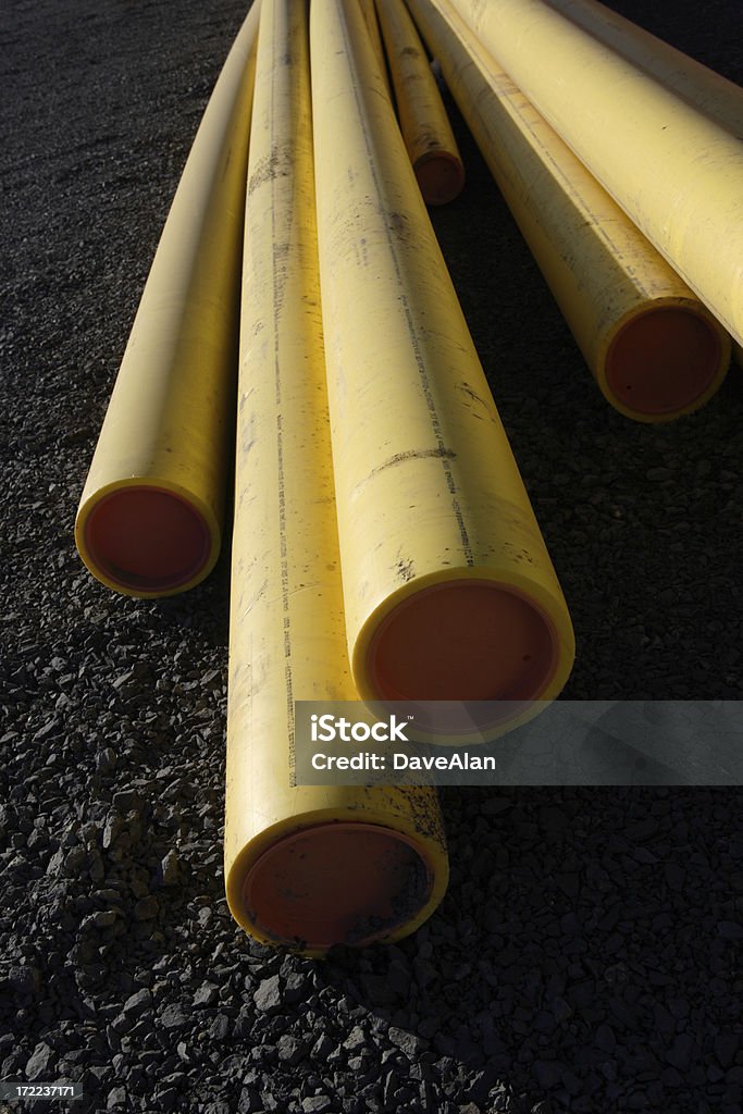 Yellow Pipes Plastic gas pipes on a construction site. Gas Stock Photo