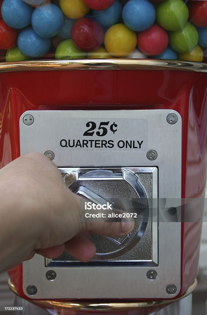 Quarters only Getting a gumball Aluminum Stock Photo