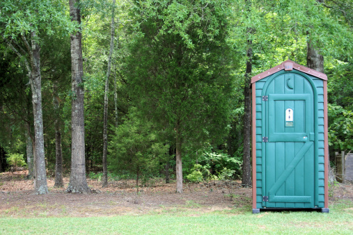 port-a-potty in the forest