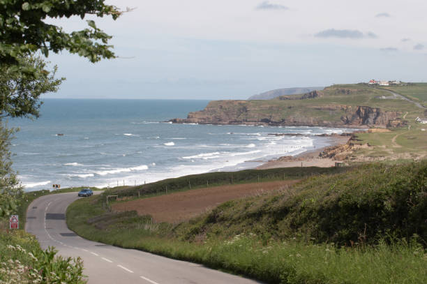 istock Widecombe Bay Cornwall and winding road 172237810