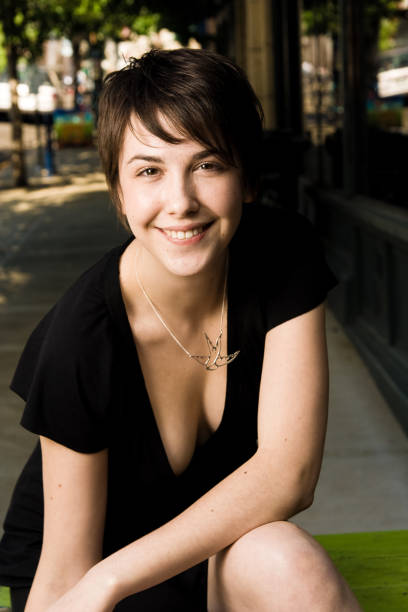 istock smiling young brunette woman 172237842