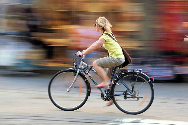 istock Blurry background of a woman on a bicycle 172238016