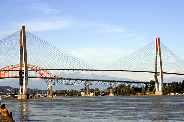 bridges over the Fraser Two bridges crossing the Fraser River in British Columbia new westminster stock pictures, royalty-free photos & images
