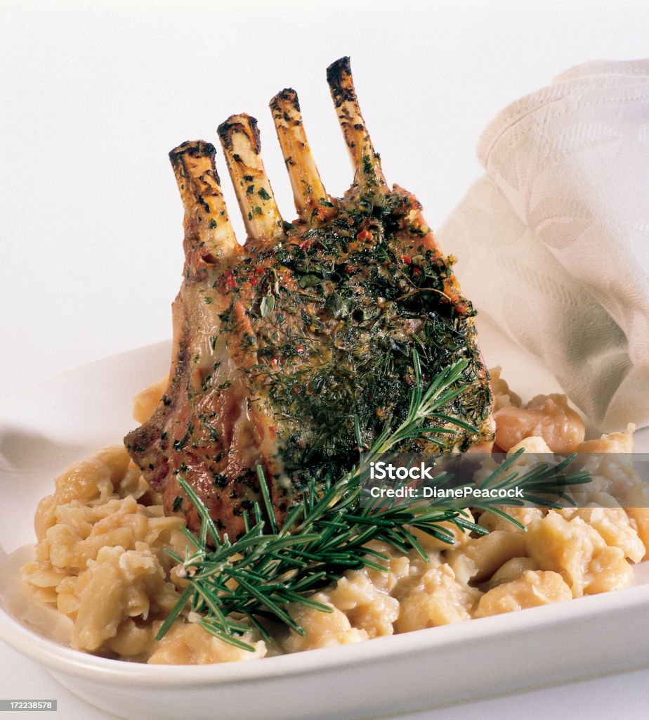 Lanb Cutlets Spicy lamb culet on a bed of mashed yams. Rack of Lamb Stock Photo