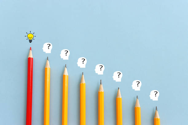 istock bright light bulb and question mark with pencils concept image 1722386602
