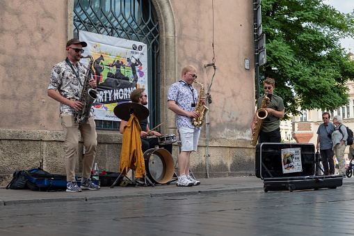 Street musicians on street of old city. Poland, Krakow, September 17, 2023