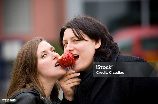 Eating An Apple — стоковые фотографии и другие картинки Близость - Близость, Взрослый, Горизонтальный