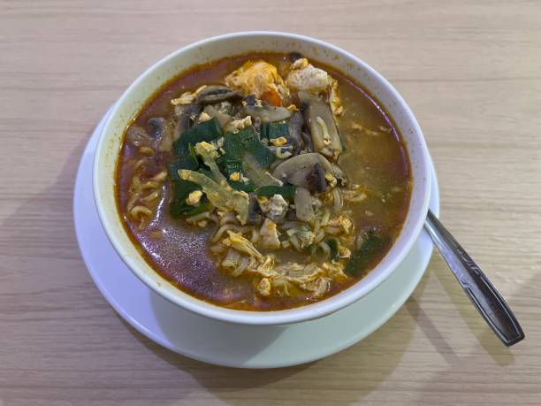 istock Curry ramen noodles with egg, mushroom and creamy broth 1722390228