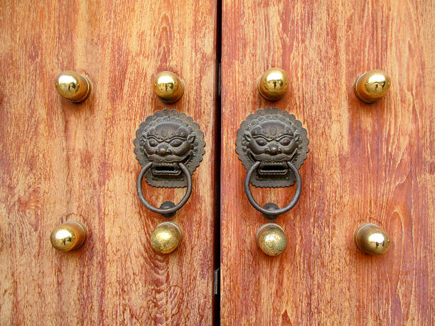 closed wooden temple door stock photo