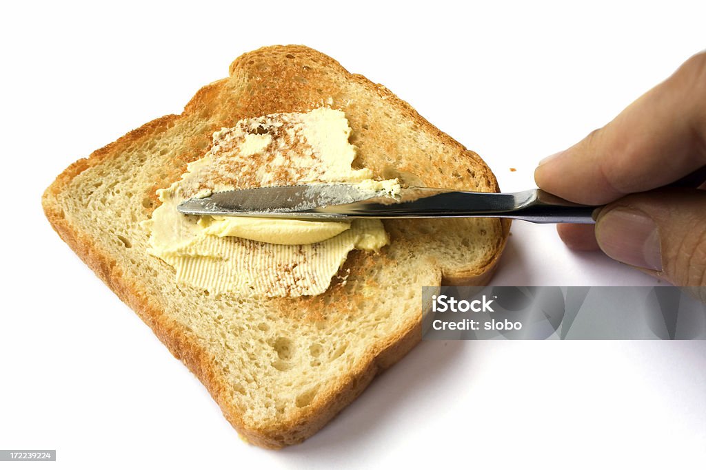 Aufstreichen butter auf getoastetem Brot - Lizenzfrei Aufstrich Stock-Foto
