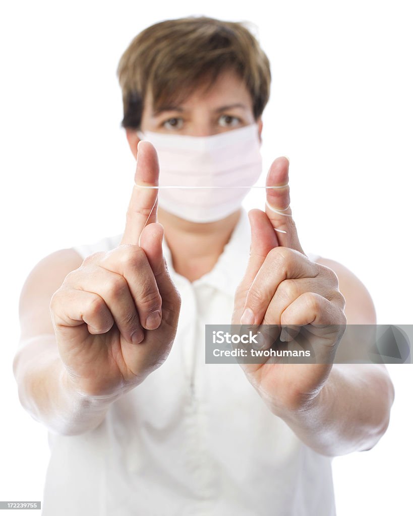 Daily routine "Dental hygienist holding dental floss between her fingers. Concepts: Hygiene, health; toothbrush, dentist, routine. Studio photography, isolated on white background, selective focus." A Helping Hand Stock Photo