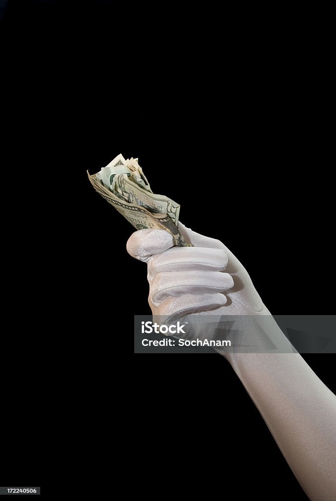 Dinero en la mano de guante Formal serie - Foto de stock de Agarrar libre de derechos