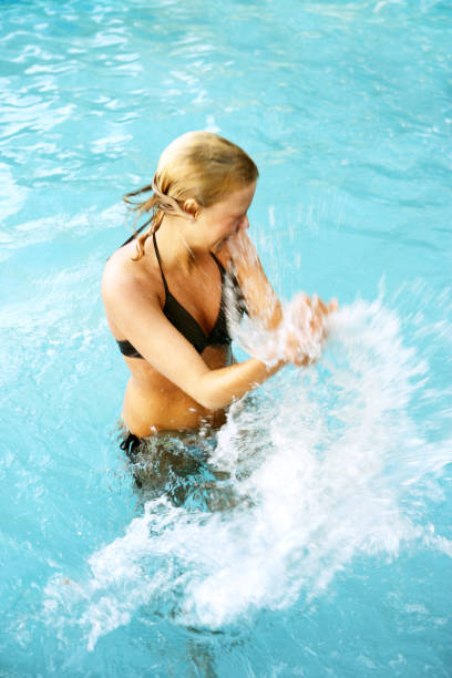 istock Woman in a swimming pool 172240873