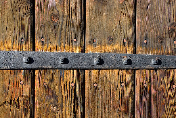detail of an old handle on an old wooden door
