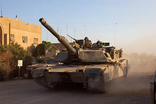 "M1 Abrams Main Battle Tank crew prepares for combat patrol in Ramadi, Iraq. See more images from this series here;"