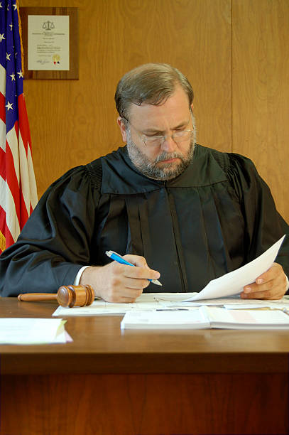 istock Judge Signs a Court Order 172241799