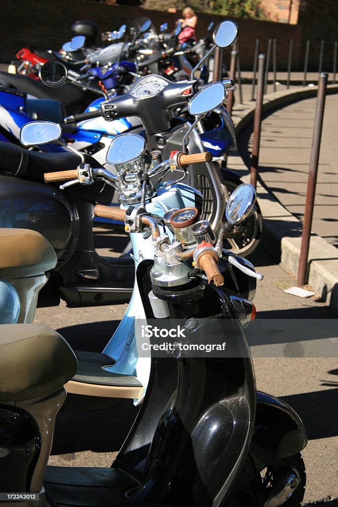 Mopeds parking Mopeds parking in the sity centre Adult Stock Photo