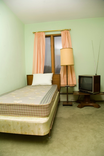 Old untouched 1960s dormitory nursing home room.