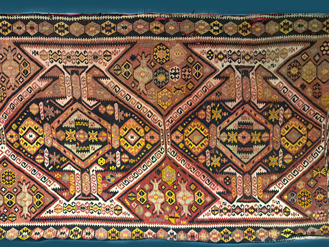 An Afghan rug (or Afghan carpet) is a type of handwoven floor-covering textile traditionally made in Afghanistan. ... They are made by Afghanistan's Baloch people in the south-western part of the country. Various vegetable and other natural dyes are used to produce the rich colors. The rugs are mostly of medium sizes. Photo capture in Afghanistan Gallery,  Kolkata International Trade Fair.