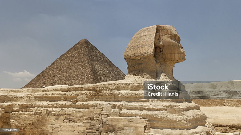 Sphinx and the Great pyramid "The Sphinx and the pyramid of Cheops in Giza, Egypt" Adulation Stock Photo