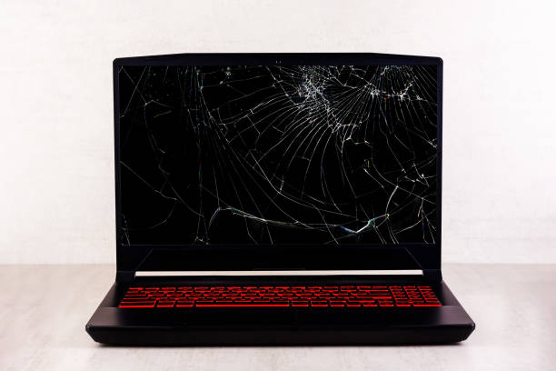 istock a gaming laptop with a broken screen in cracks on a gray background close up front view 1722432918