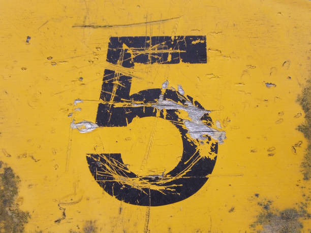 painted wooden wall with number