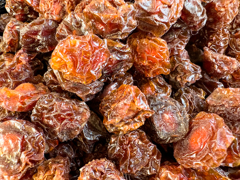 A close-up of dried sweet dates on display at the local market
