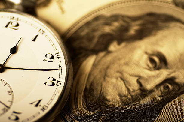 el tiempo es dinero (oro tono - time makes money fotografías e imágenes de stock