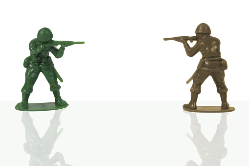 Toy soldiers with guns.