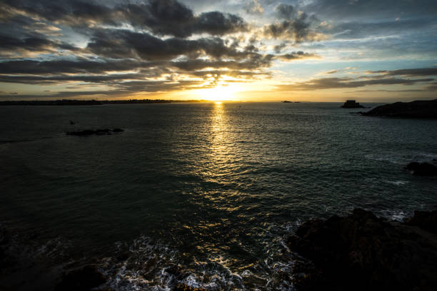 Sunset on Bon-Secours Beach, a beach located in front of the ramparts and the old town.