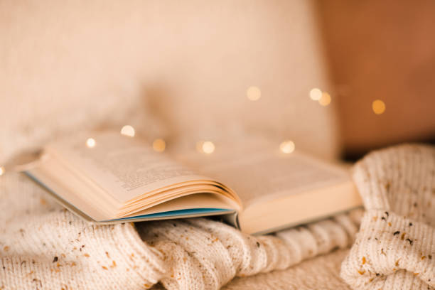 istock Paper book with xmas lights closeup 1722439419
