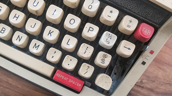 Close up photo of antique typewriter keys, shallow focus