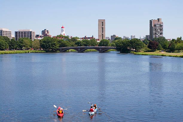Kayaking down the Charles River "Two Kayaks on the Charles River, Boston, MassachusettsPlease see other Charles River photos from my portfolio:" charles river stock pictures, royalty-free photos & images