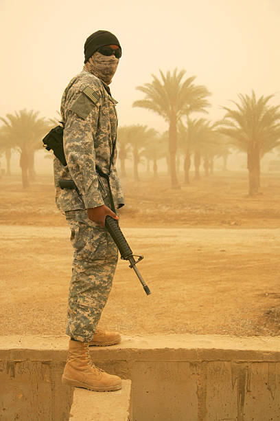 istock masked soldier in sandstorm 172246199