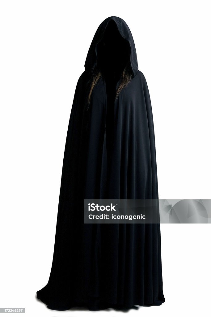 Witch Female figure in black cape. Cape - Garment Stock Photo