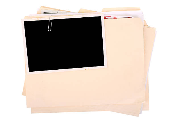 Police Case File Police case file with blank photo frame attached with paper clip. medical record photos stock pictures, royalty-free photos & images