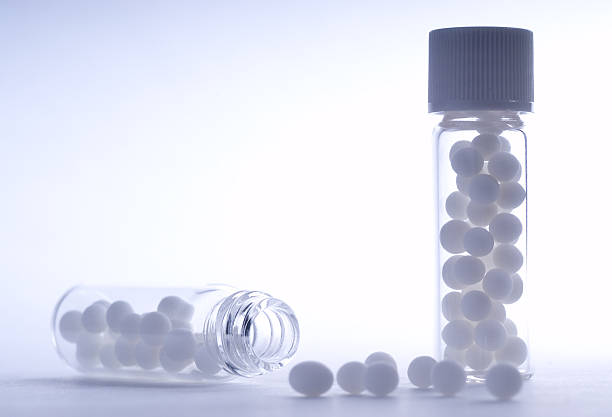 Two bottles of homeopathic pills