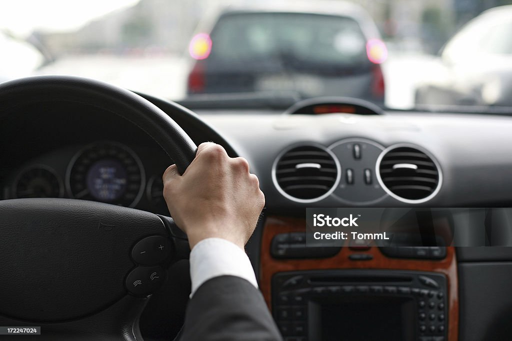 Driving a car inside a luxury car - businessman driving Tailgating Stock Photo