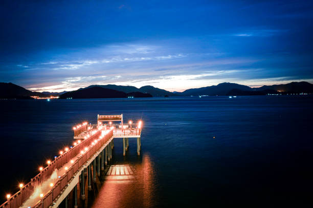 landscape view with river mountain and blue sky with bridge and lighting
