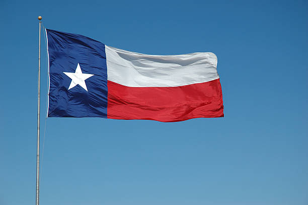 battenti bandiera del texas - texas state flag foto e immagini stock