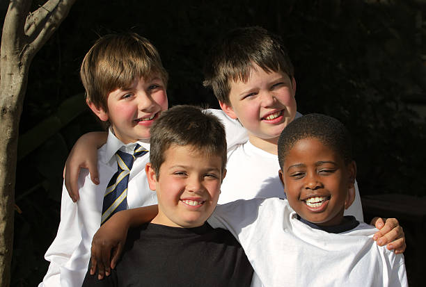 istock Four Schoolboy Friends posing 172248296